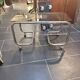 Coffee table with chrome base and smoked glass from the 70s