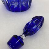 Midnight blue carafe with multiple reflections