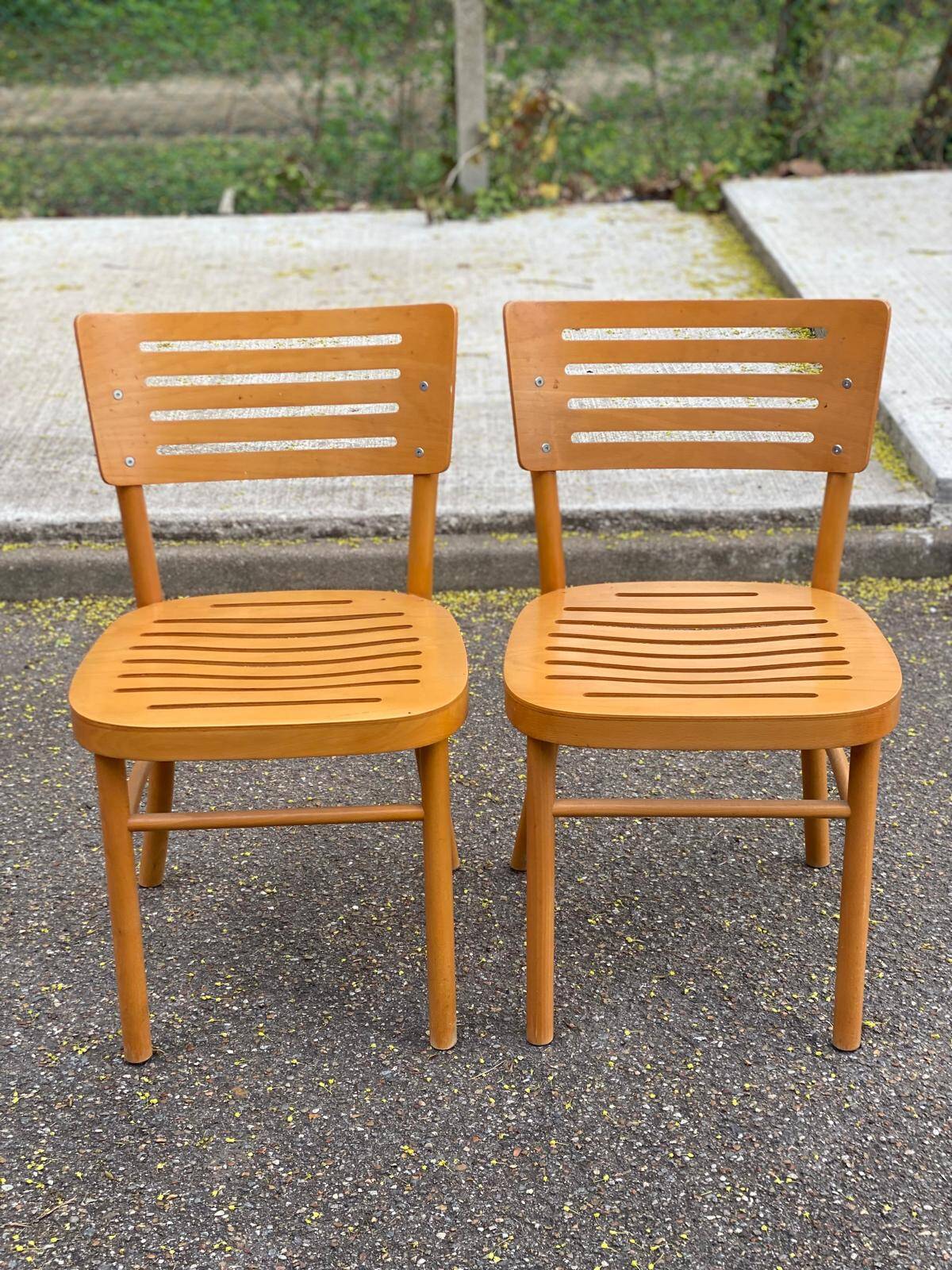 2 Scandinavian bistro chairs from Ikea, Balser, made of curved solid wood, 1999.
