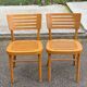 2 Scandinavian bistro chairs from Ikea, Balser, made of curved solid wood, 1999.