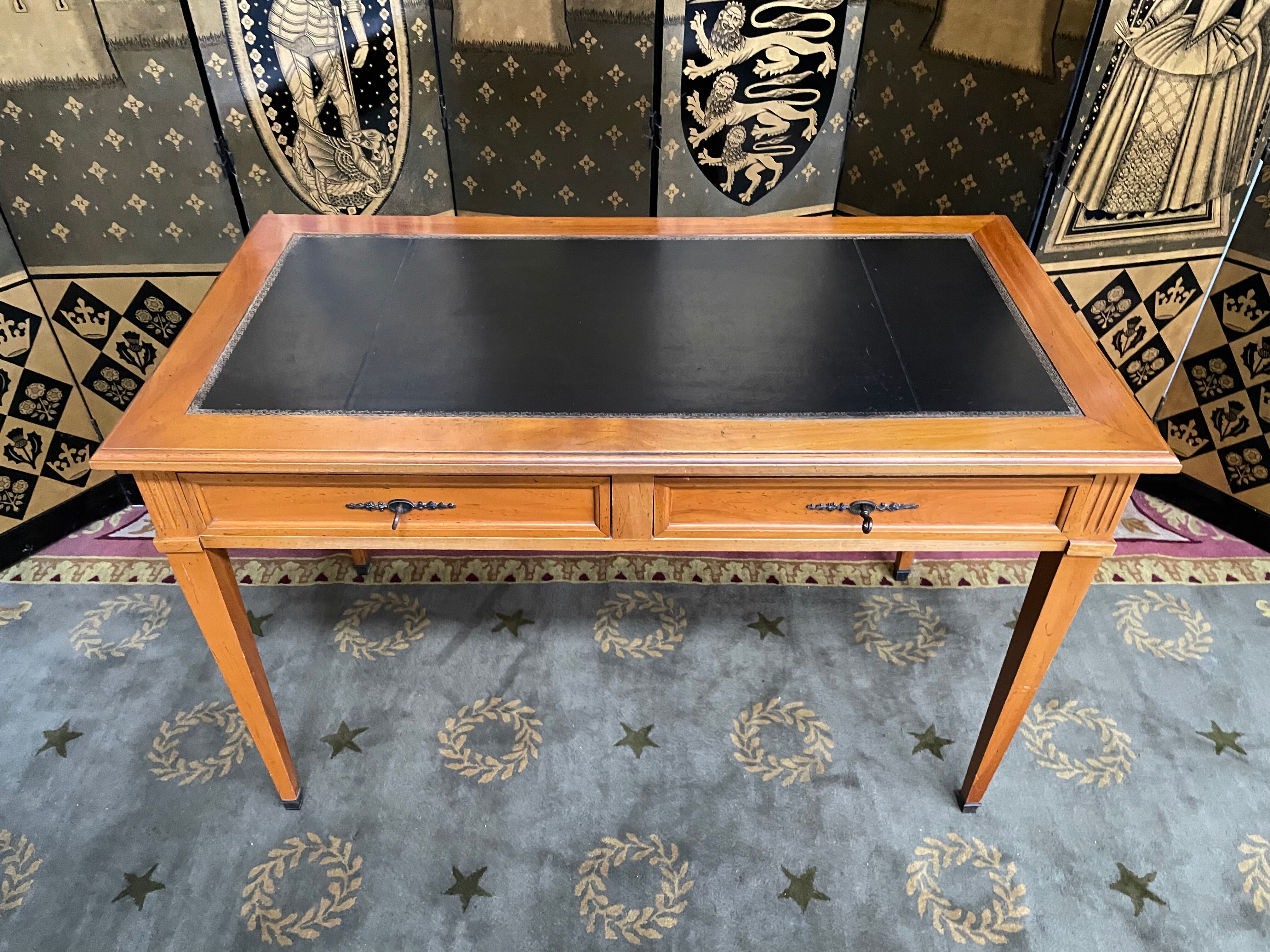 Desk full of Louis XVI style black leather