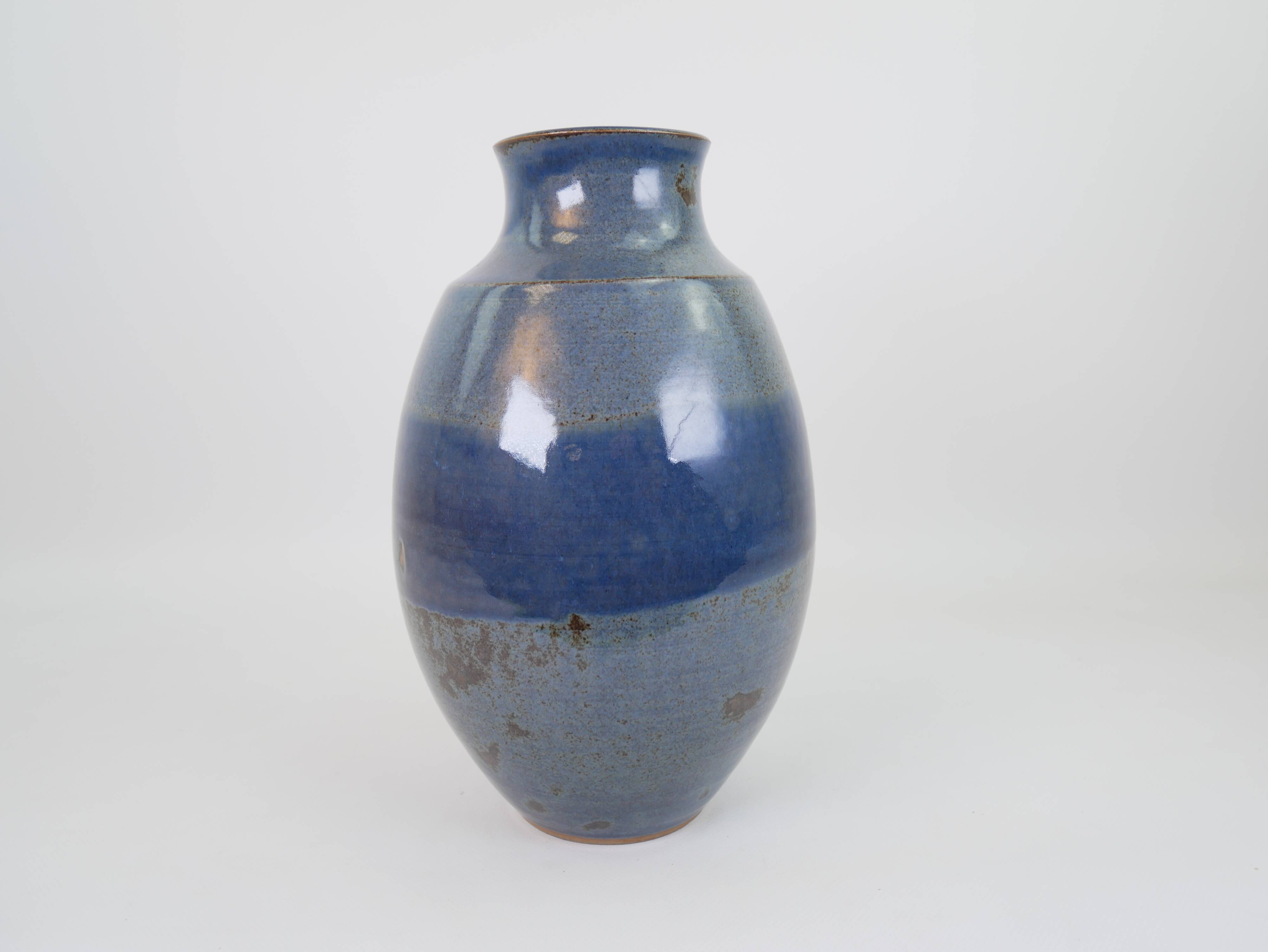 Large blue glazed ceramic vase signed under the base
