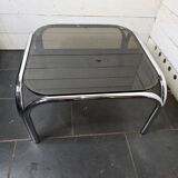 Chrome metal coffee table with smoked glass top from the 70s