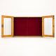 Vintage wall display cabinet in moulded wood and glass – burgundy background