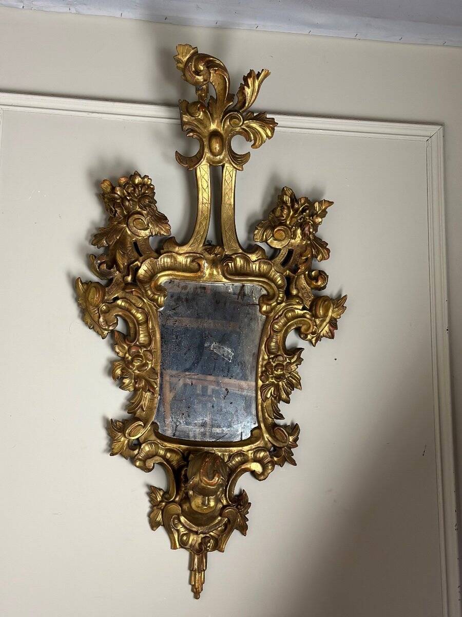 Pair of carved and gilded wooden mirrors, Italy 19th century