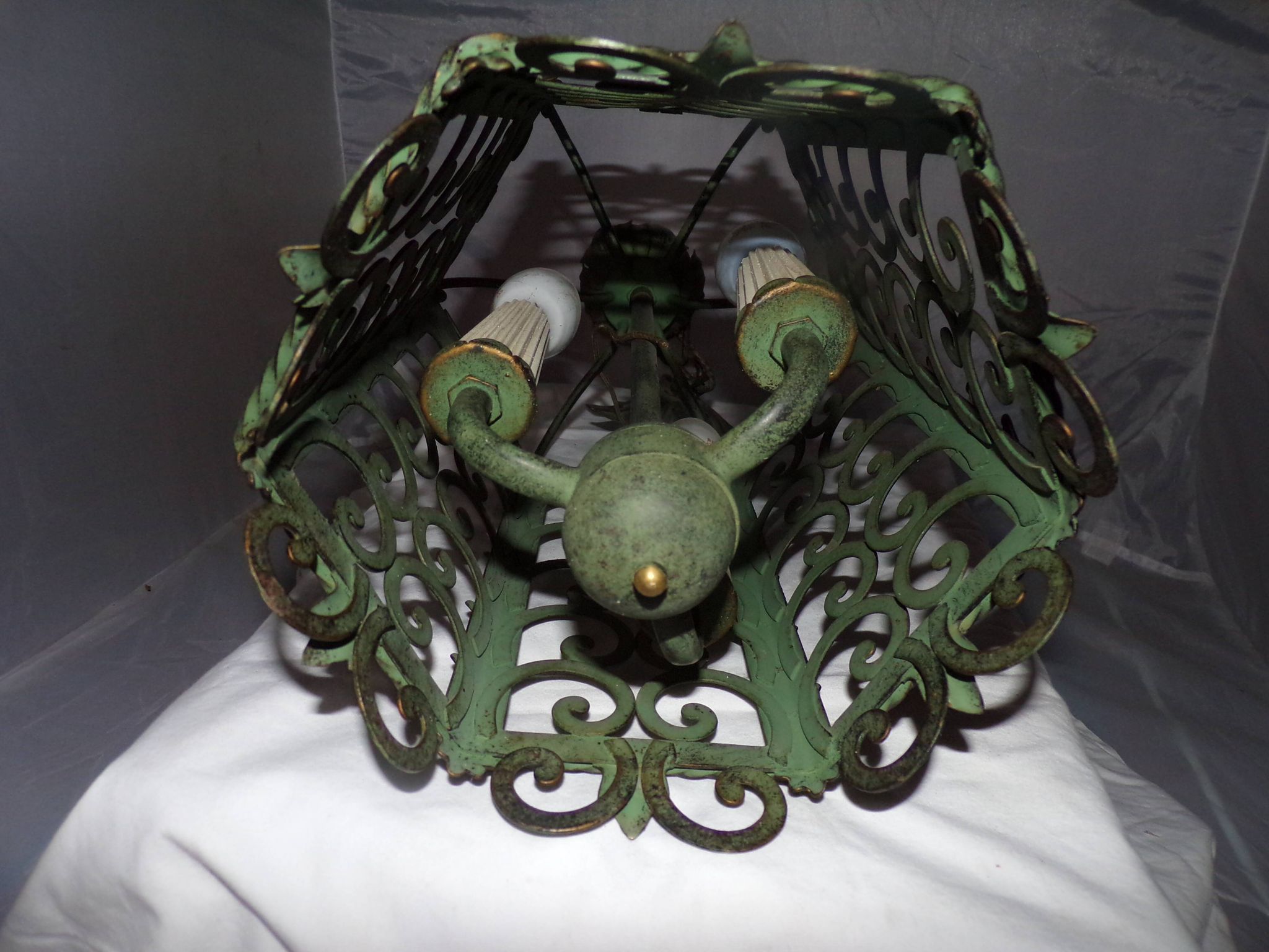 Lantern Cage 3 green lacquered metal lights work neatly from the 70s