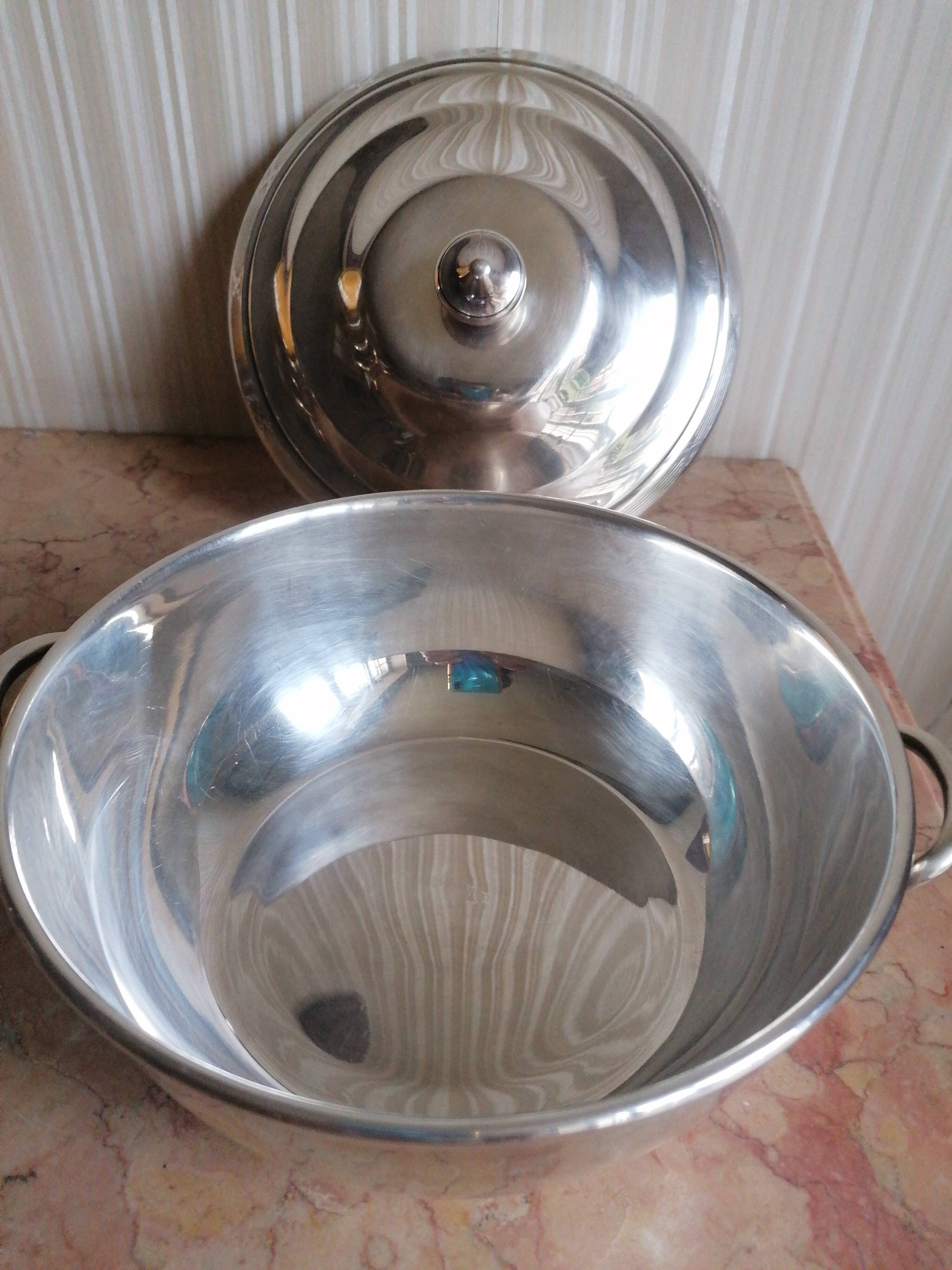 silver metal vegetable dish with crossed ribbon decoration