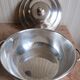 silver metal vegetable dish with crossed ribbon decoration