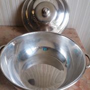 silver metal vegetable dish with crossed ribbon decoration