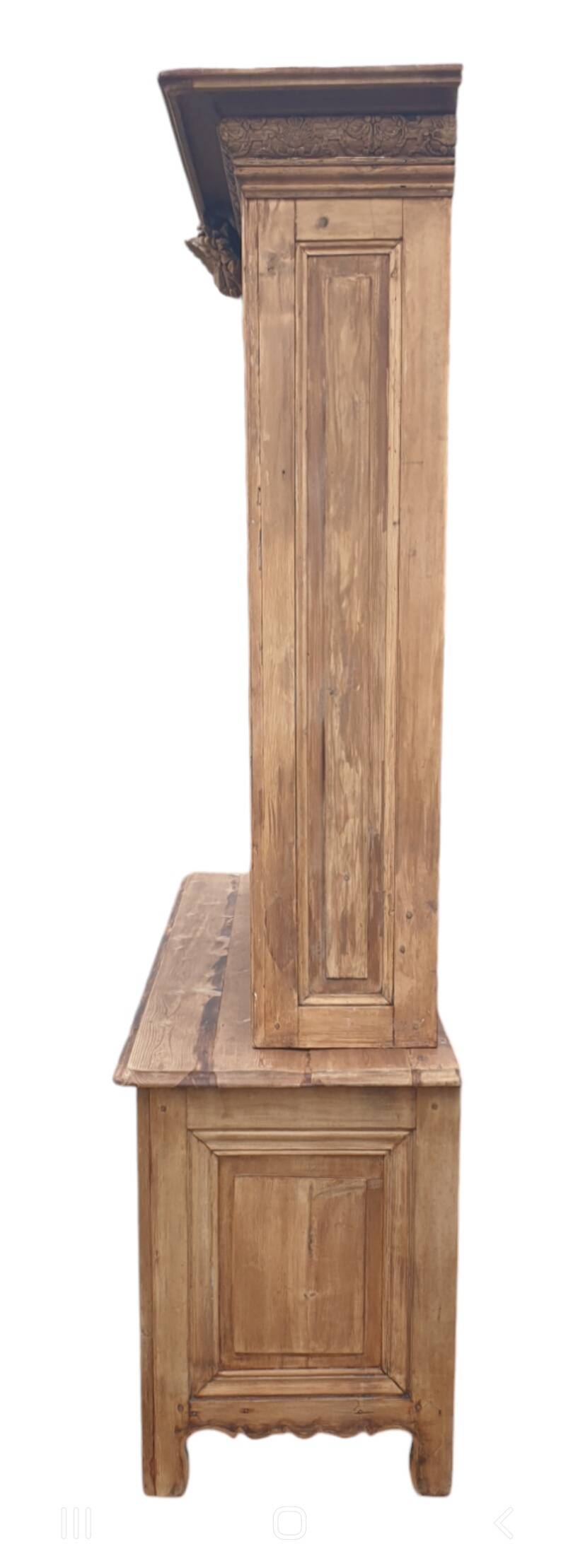 Natural wood bookcase with 3 doors and shelves