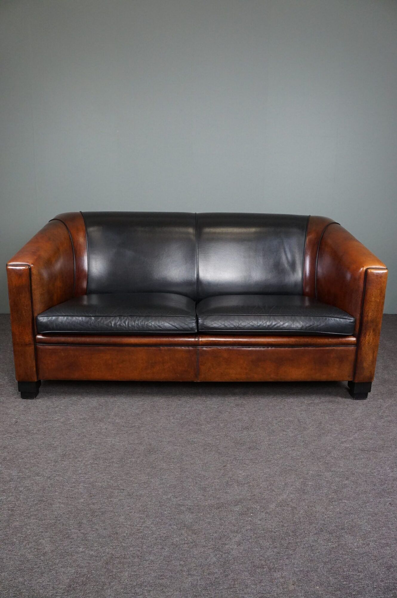 2.5-seater art deco style sofa in sheepskin