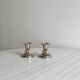 Pair of small antique metal candlesticks