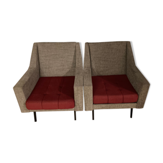 Two grey and red armchairs