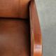 Sheepskin armchair in Art Deco style with wooden armrests