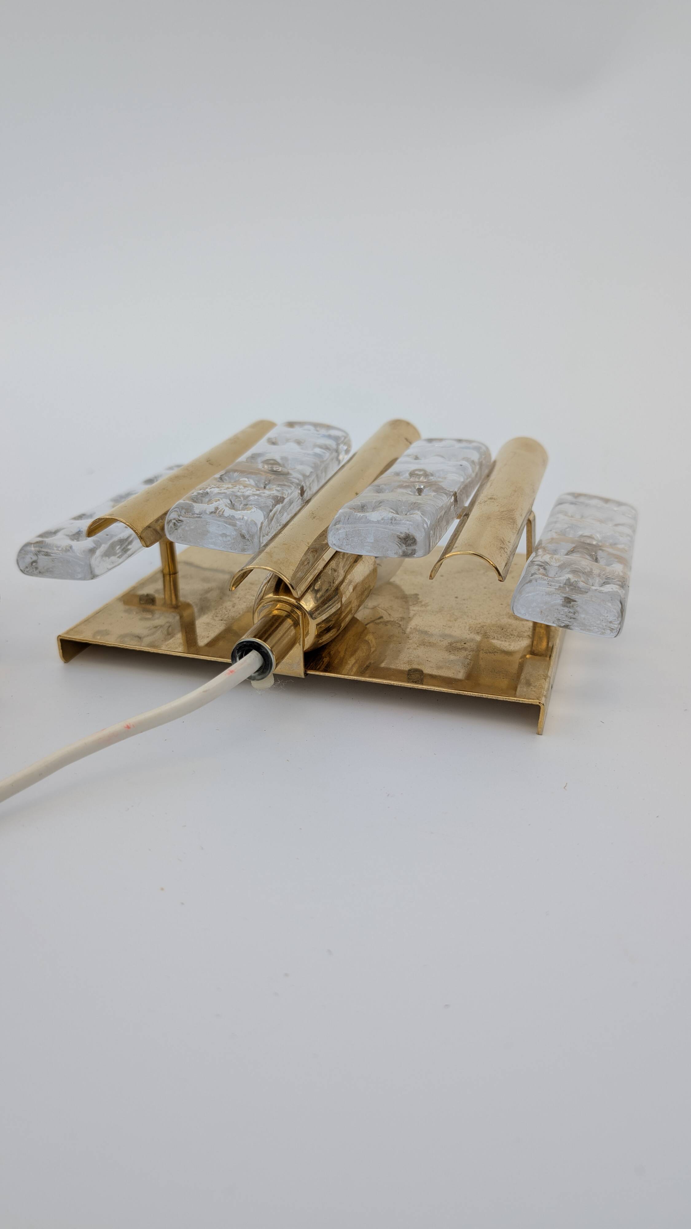 Pair of Hans-Agne Jakobsson wall lights in brass and pressed glass