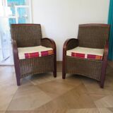 2 armchairs in woven rattan and wood, 1980s