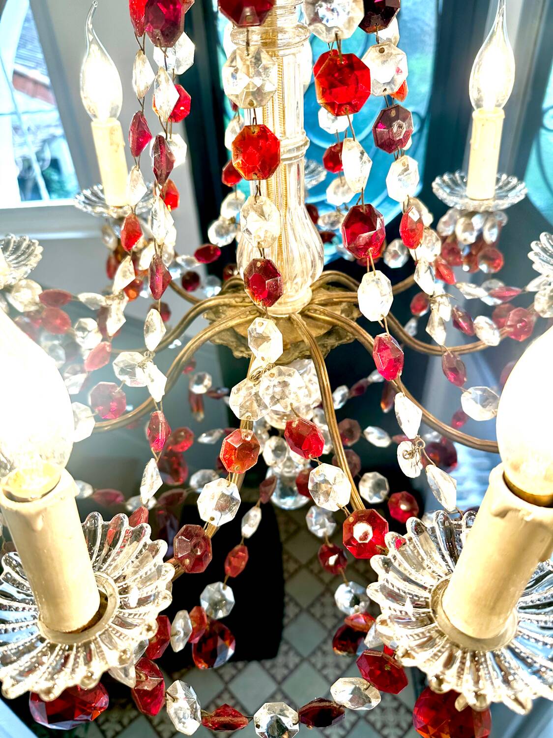 Antique chandelier with red crystal pendants, 9 lights.