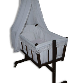 Former cradle swing and bars on wheels