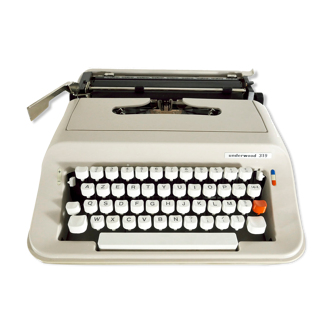 Underwood 319 beige typewriter revised new ribbon
