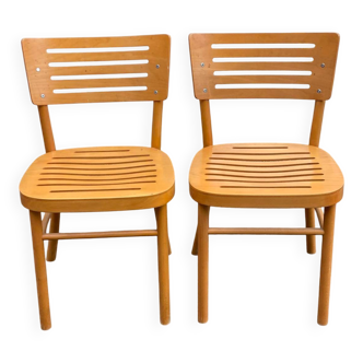 2 Scandinavian bistro chairs from Ikea, Balser, made of curved solid wood, 1999.