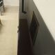 Black lacquered and brass design 70/80