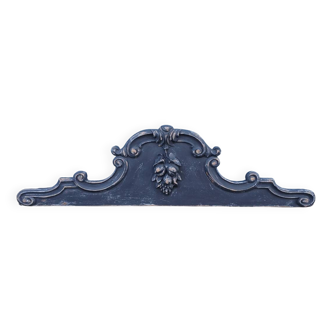 Old carved wooden pediment