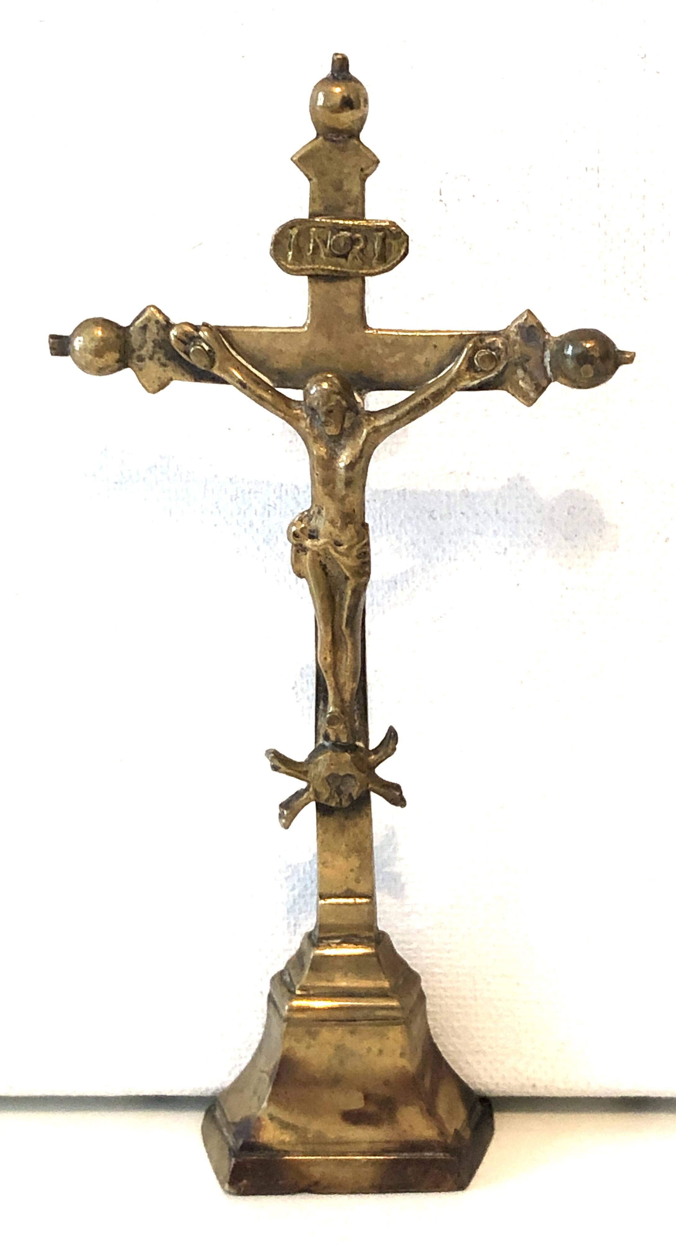 Old golden brass crucifix