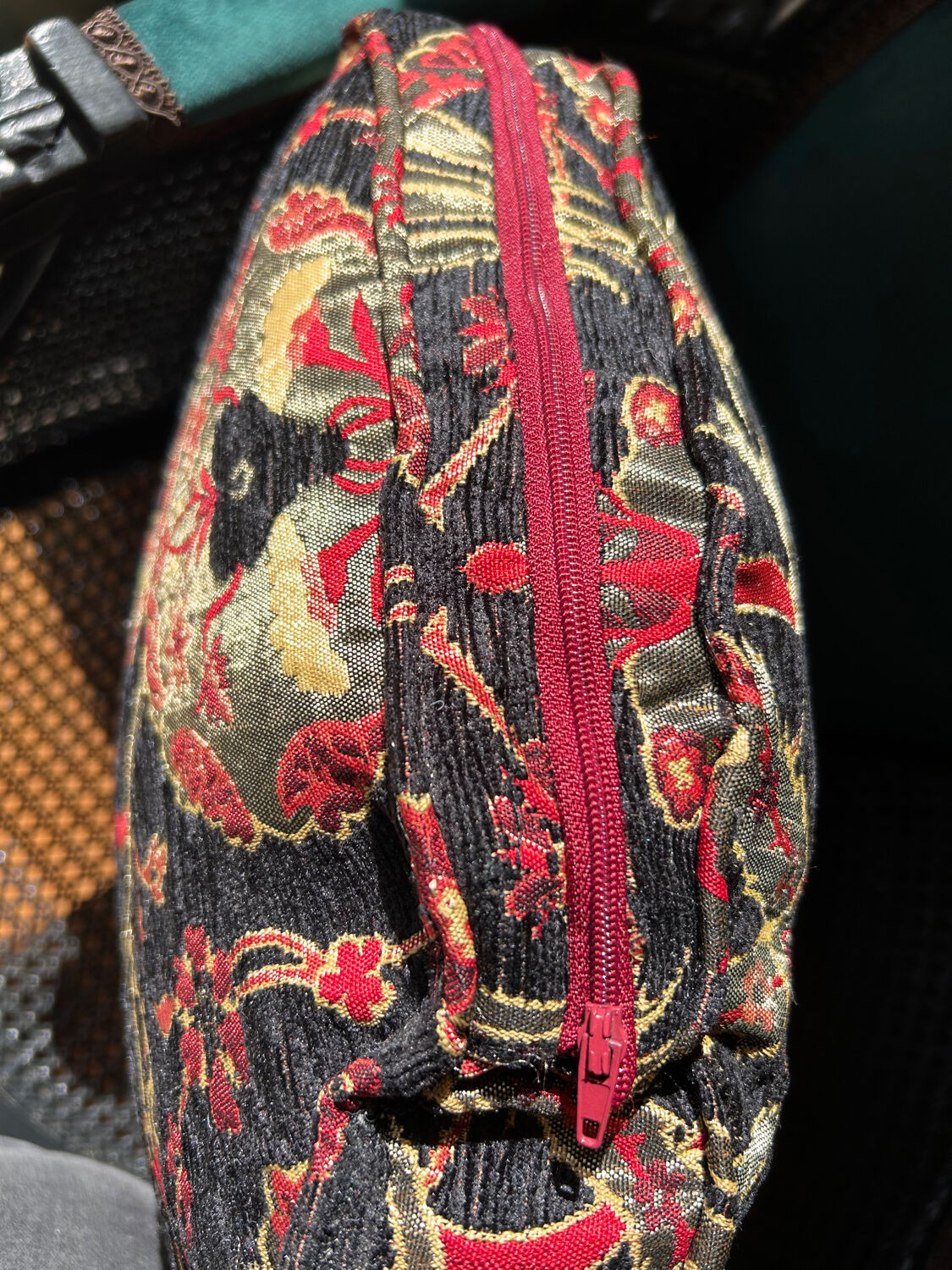 Louis XVI armchair with caning and dark green velvet