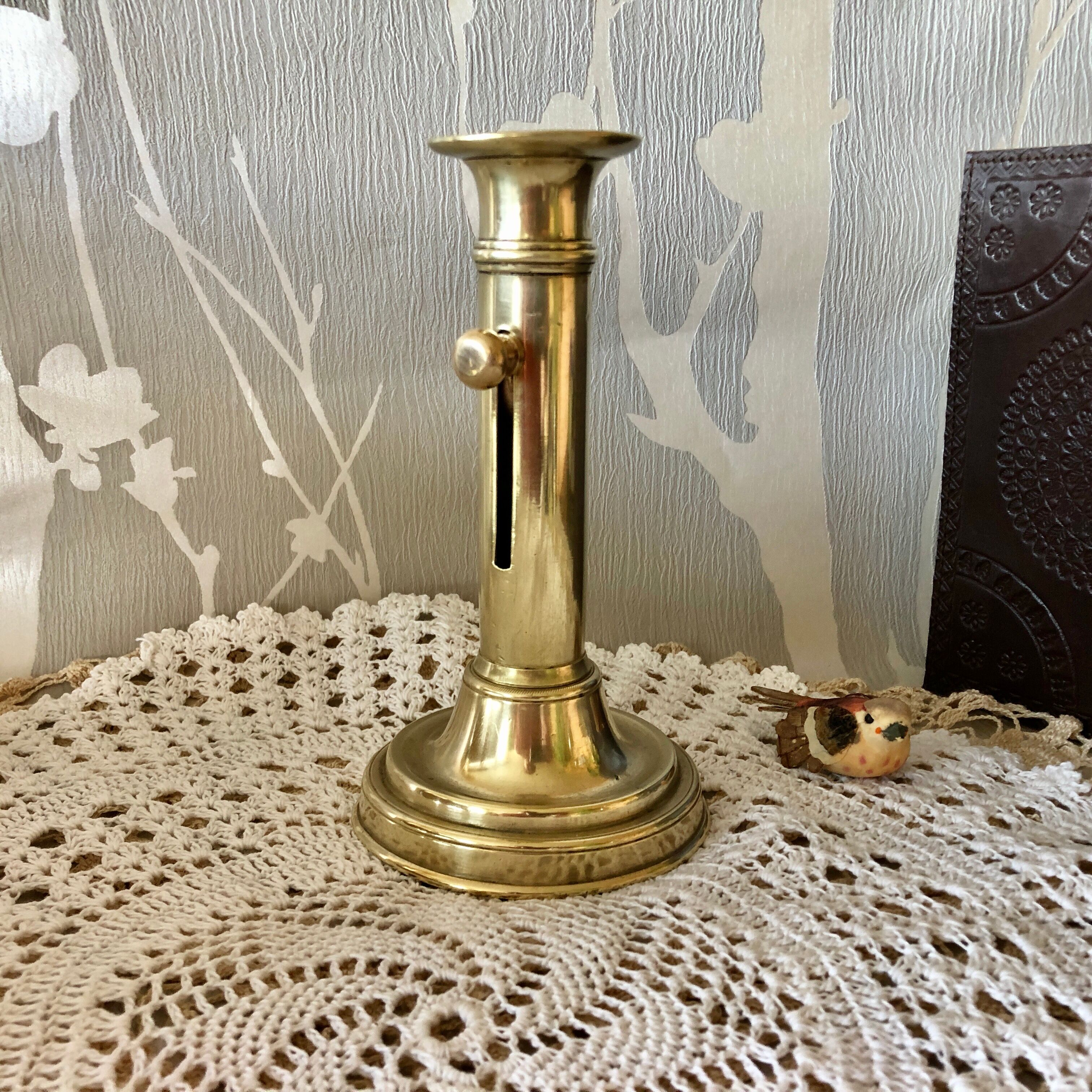 Golden copper candle holder with Belle Epoque pusher
