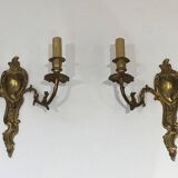 Pair of Louis XV style bronze wall sconces