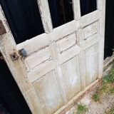 Ancient paneled solid oak door with 3 windows