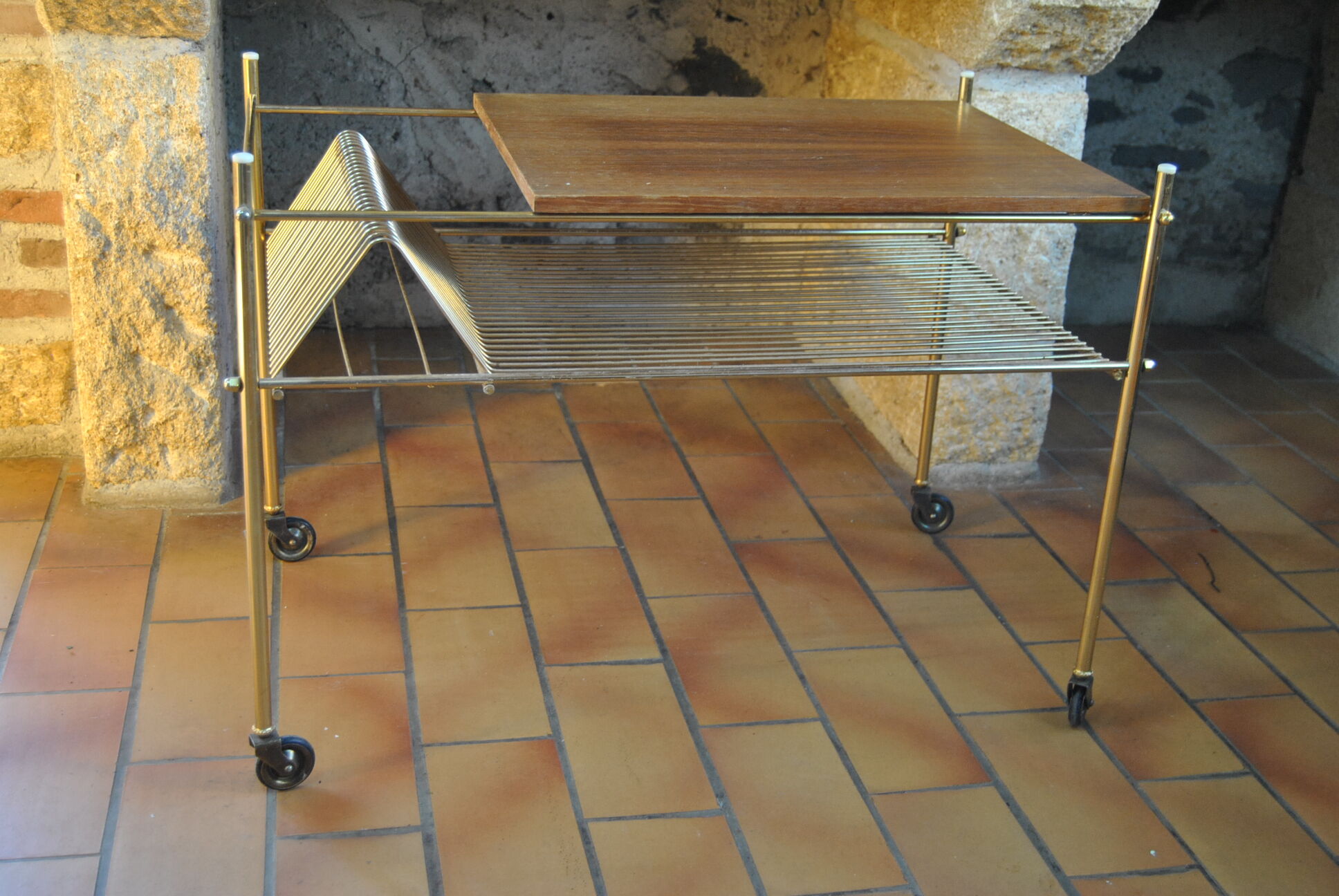 Vinyl storage cabinet with vintage wheels 70s