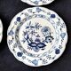 4 Royal Boch dessert plates with "Blue Onions" pattern.