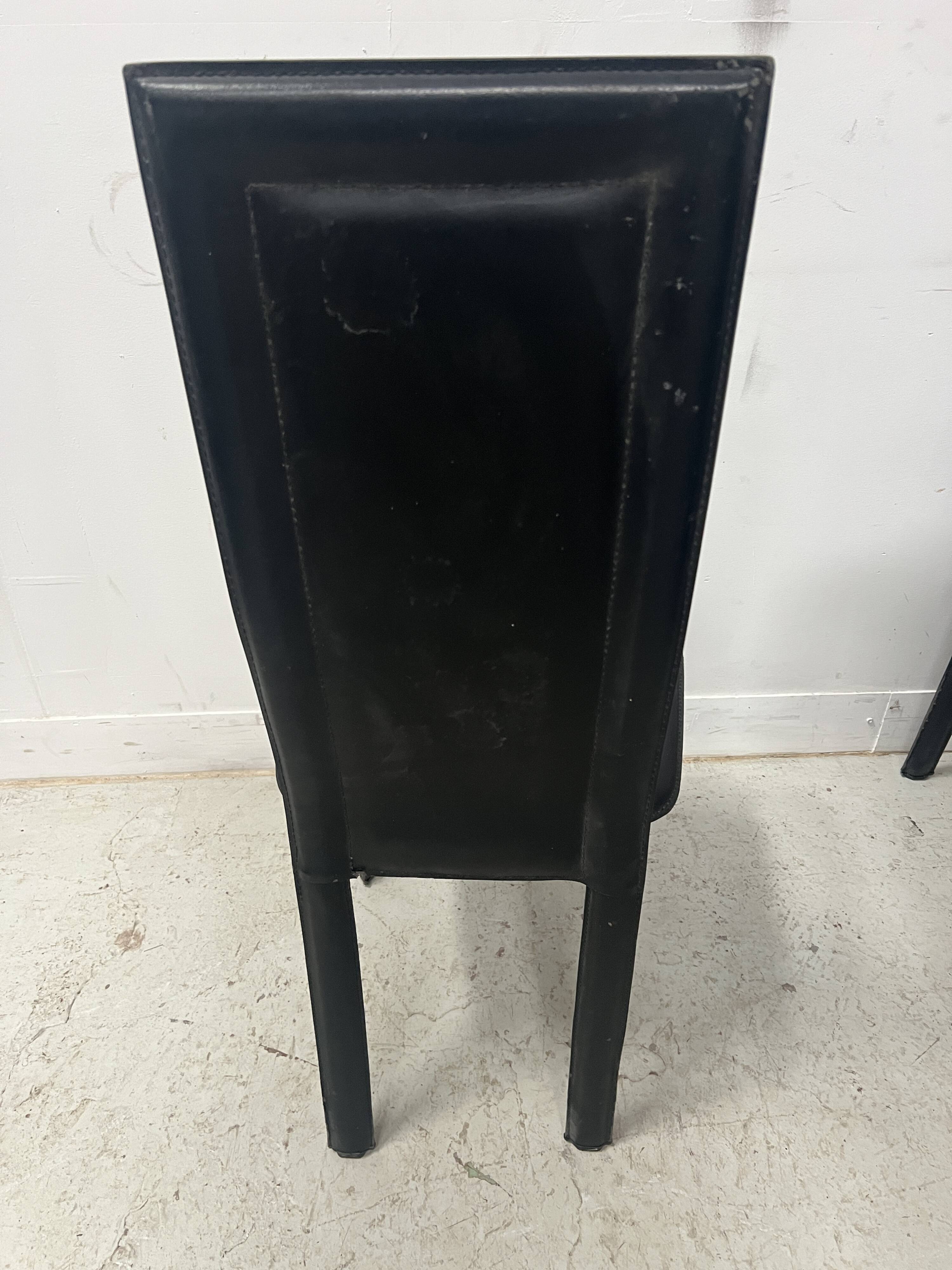 Set of eight designer chairs in black leather from the 20th century