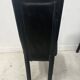 Set of eight designer chairs in black leather from the 20th century