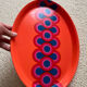 Guzzini orange plate, Ornella Noorda, 1970 design