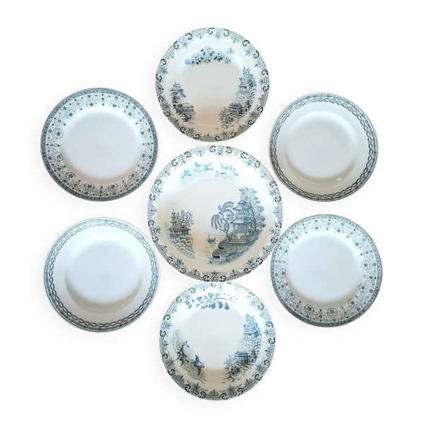 Assiettes plates anciennes dépareillées en terre de fer accompagnées d