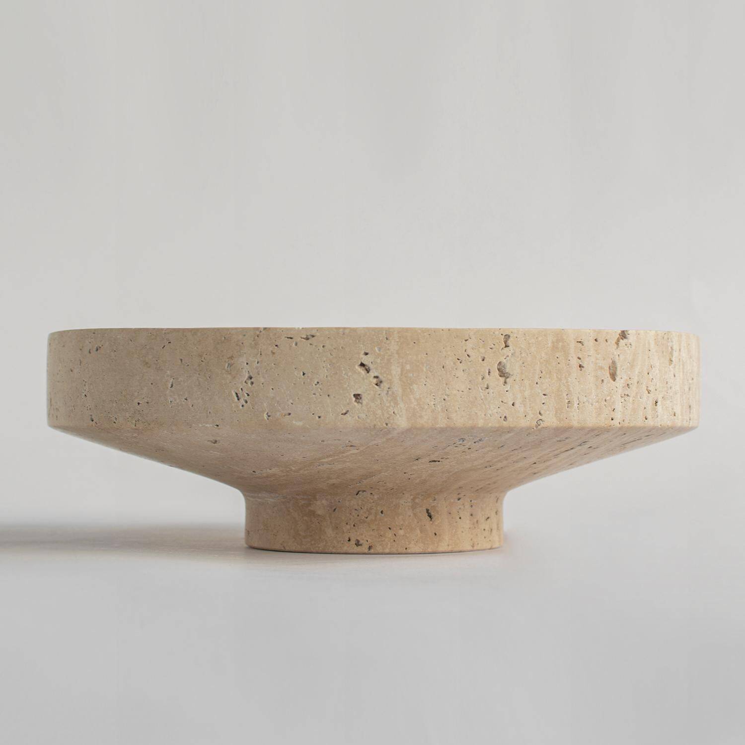 Narrow bowl in travertine