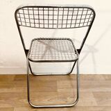 4 chrome folding chairs by Talin Cornedo