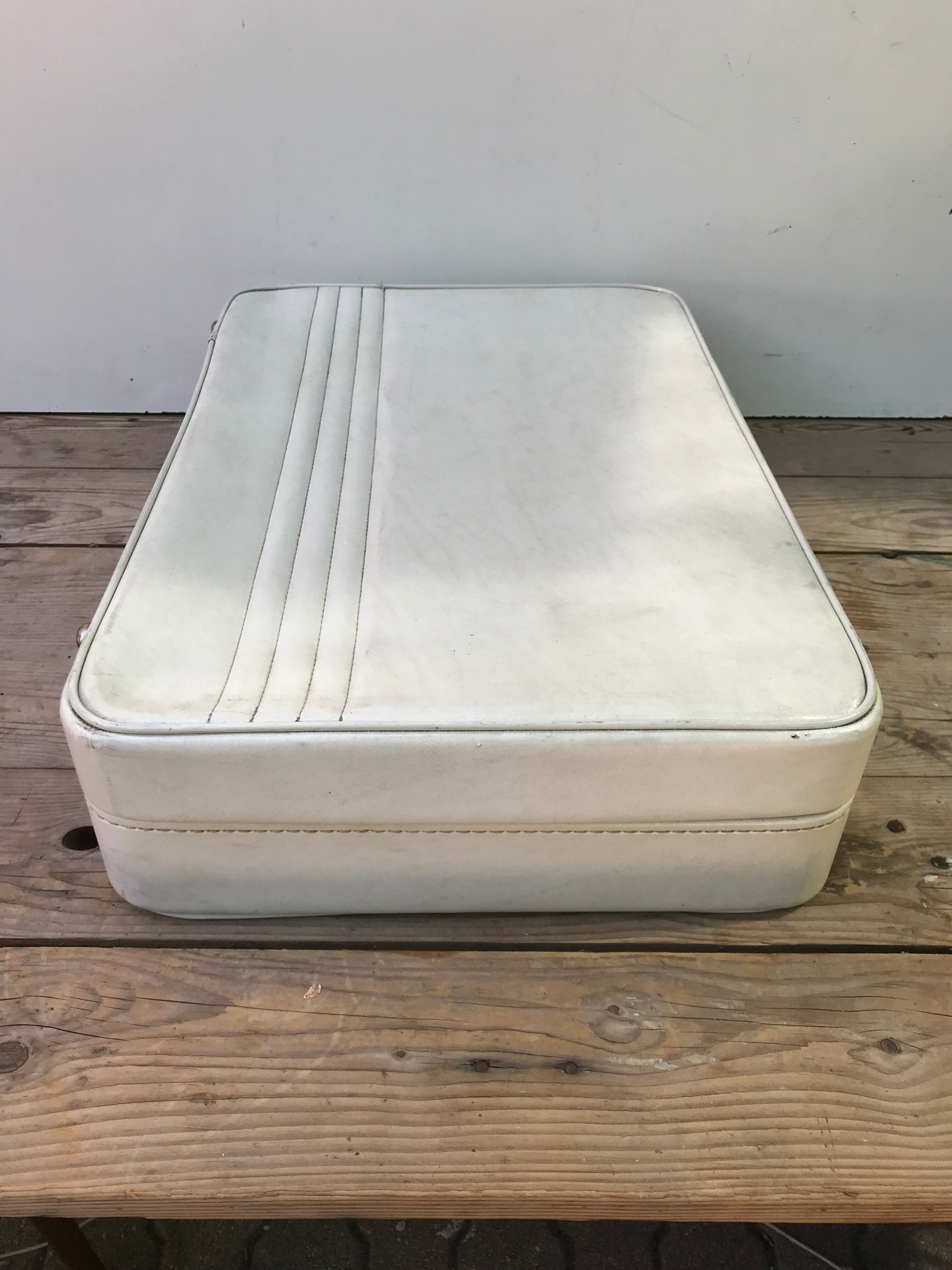 Old white leather case with vintage 70s leather handle