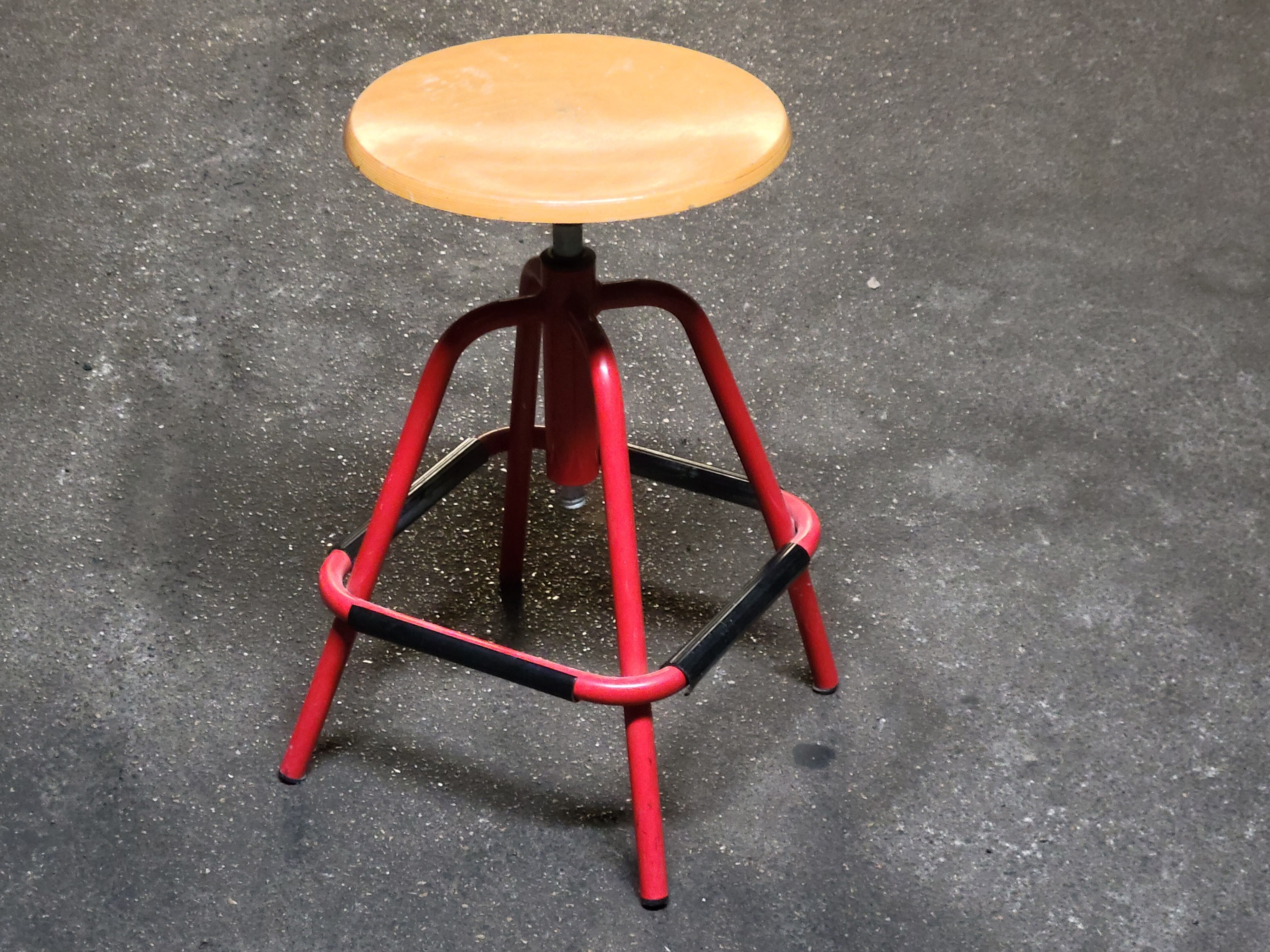 Red stool with industrial vintage screw 80s