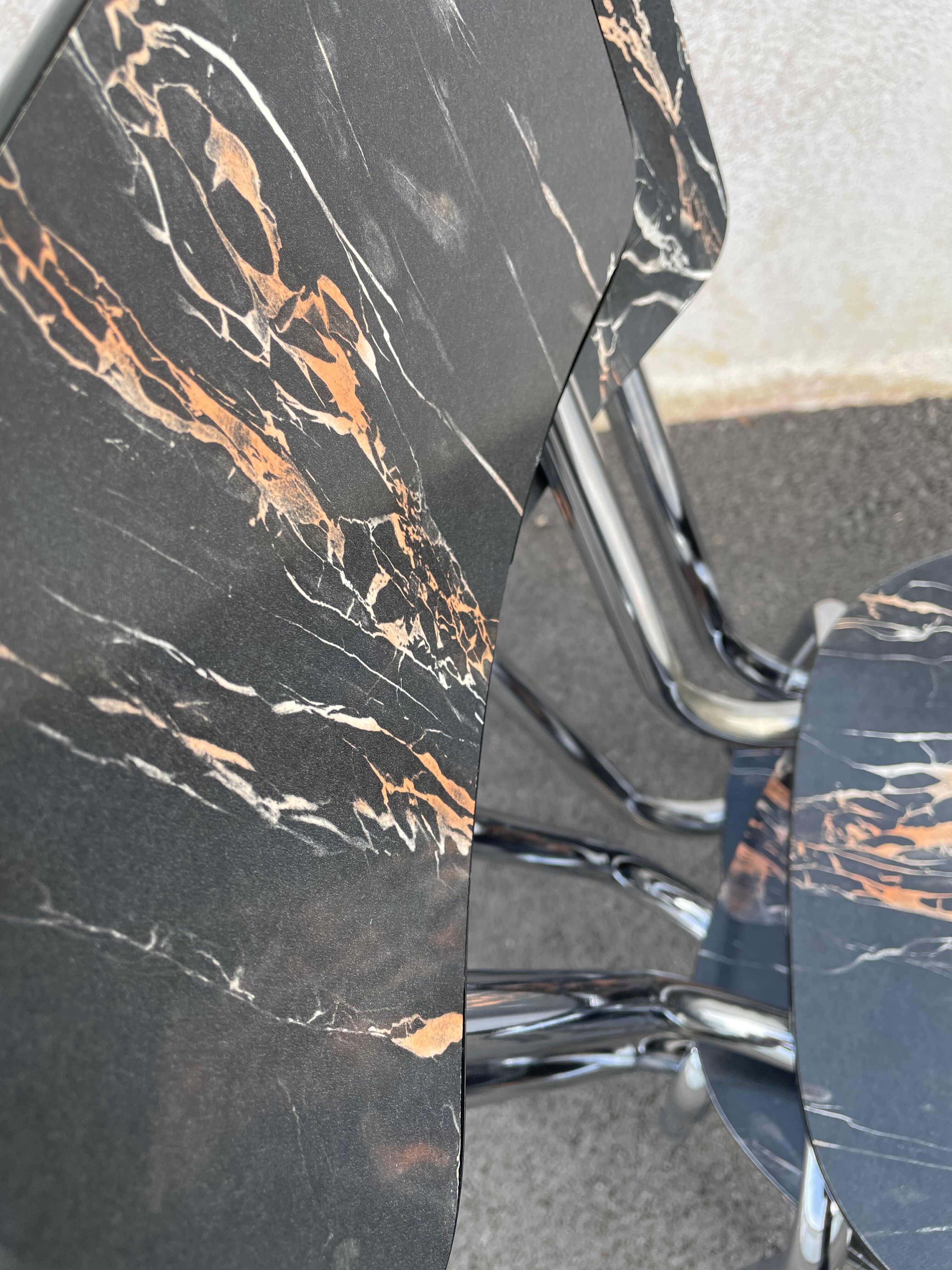 Black marbled formica chairs