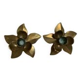 Pair of brass flower candle holders