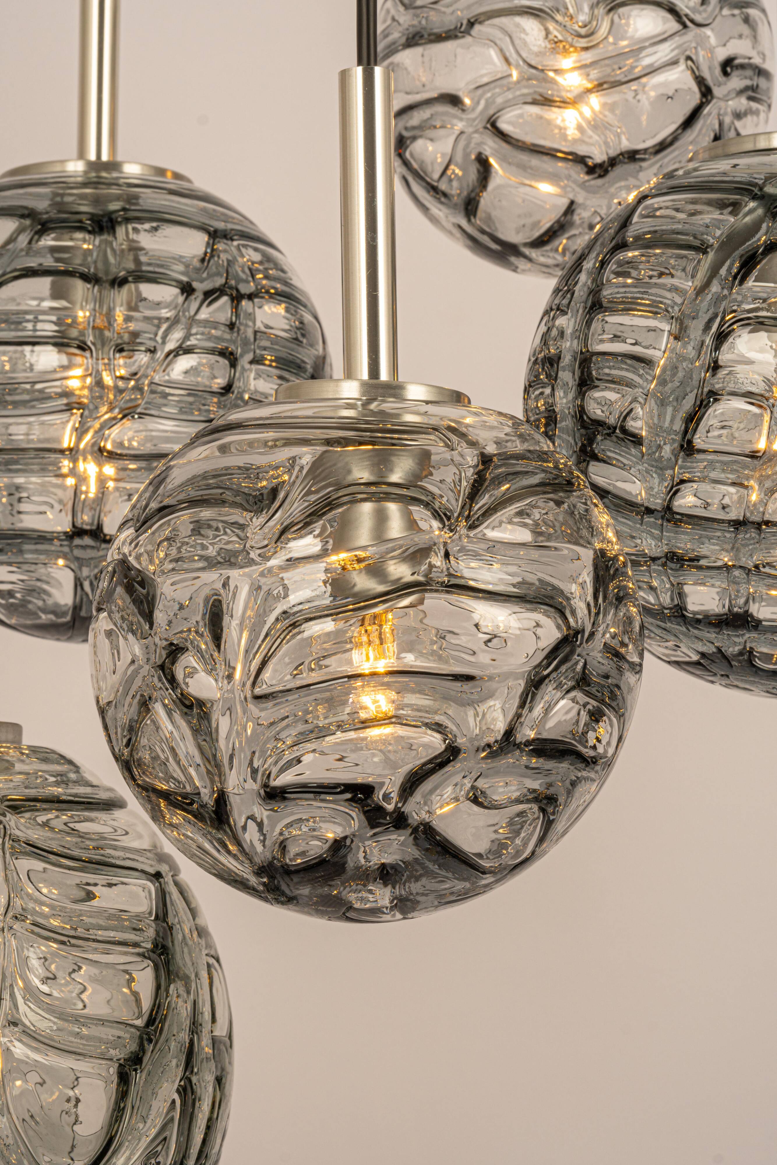 Grand cascading chandelier design with Murano glass by Doria, Germany, 1970s.