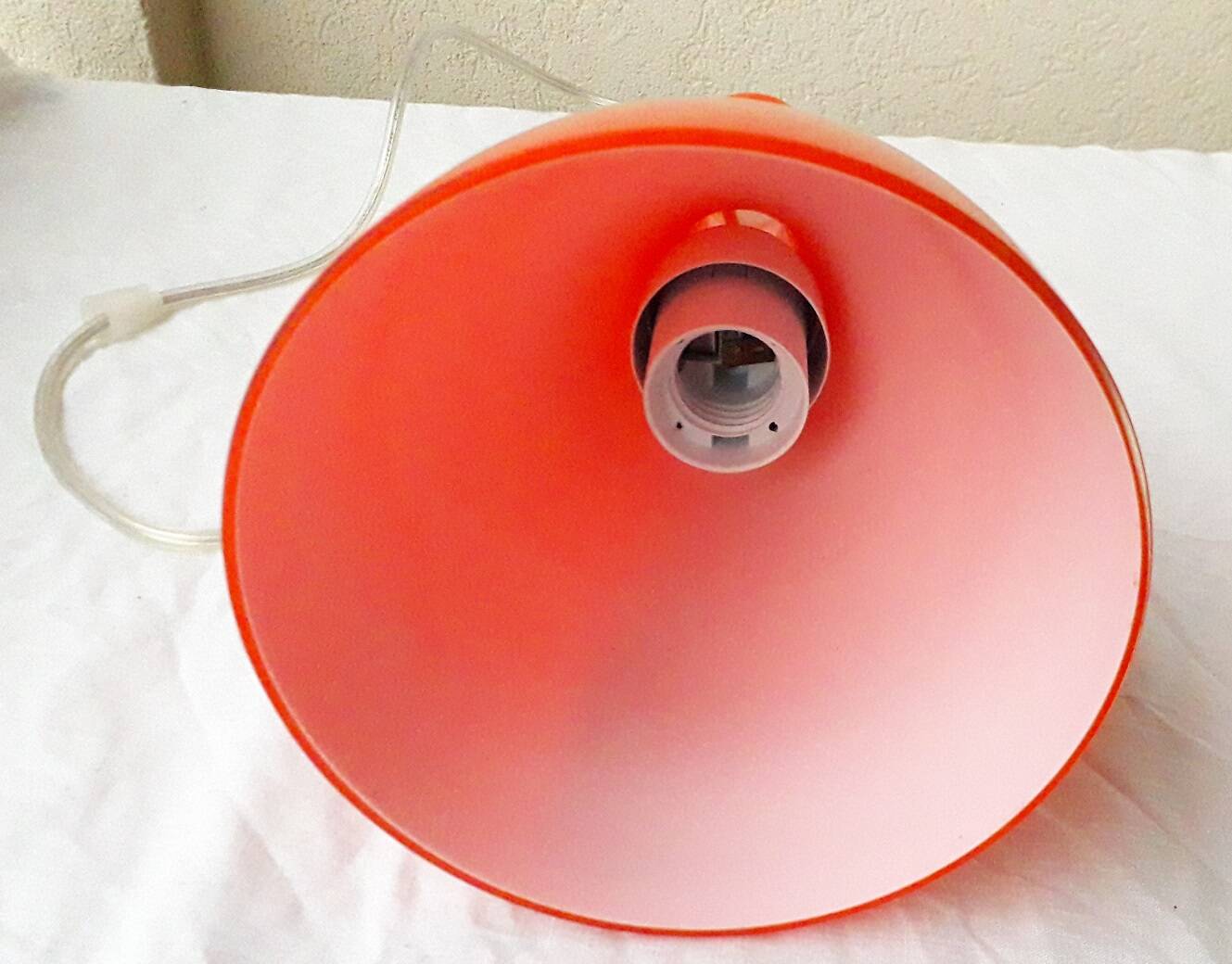 Orange glass suspension