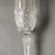 Lot of 4 large crystal flutes. Signed Arc. Height 20 cm.