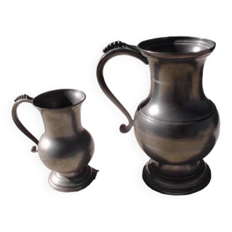 Set of 2 pewter water pitchers