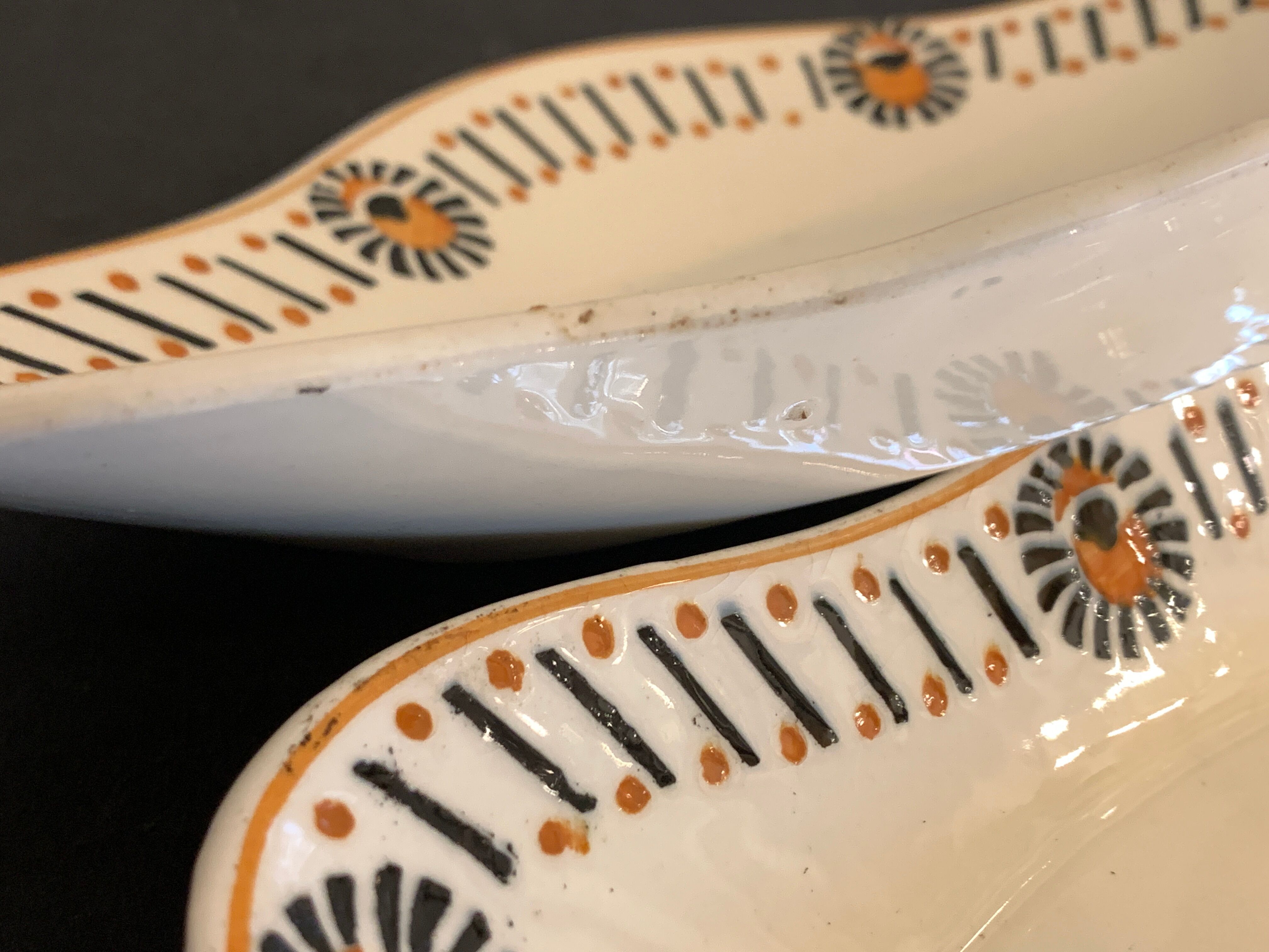 Pair of art deco raviers signed Longwy and numbered, model Gerazine