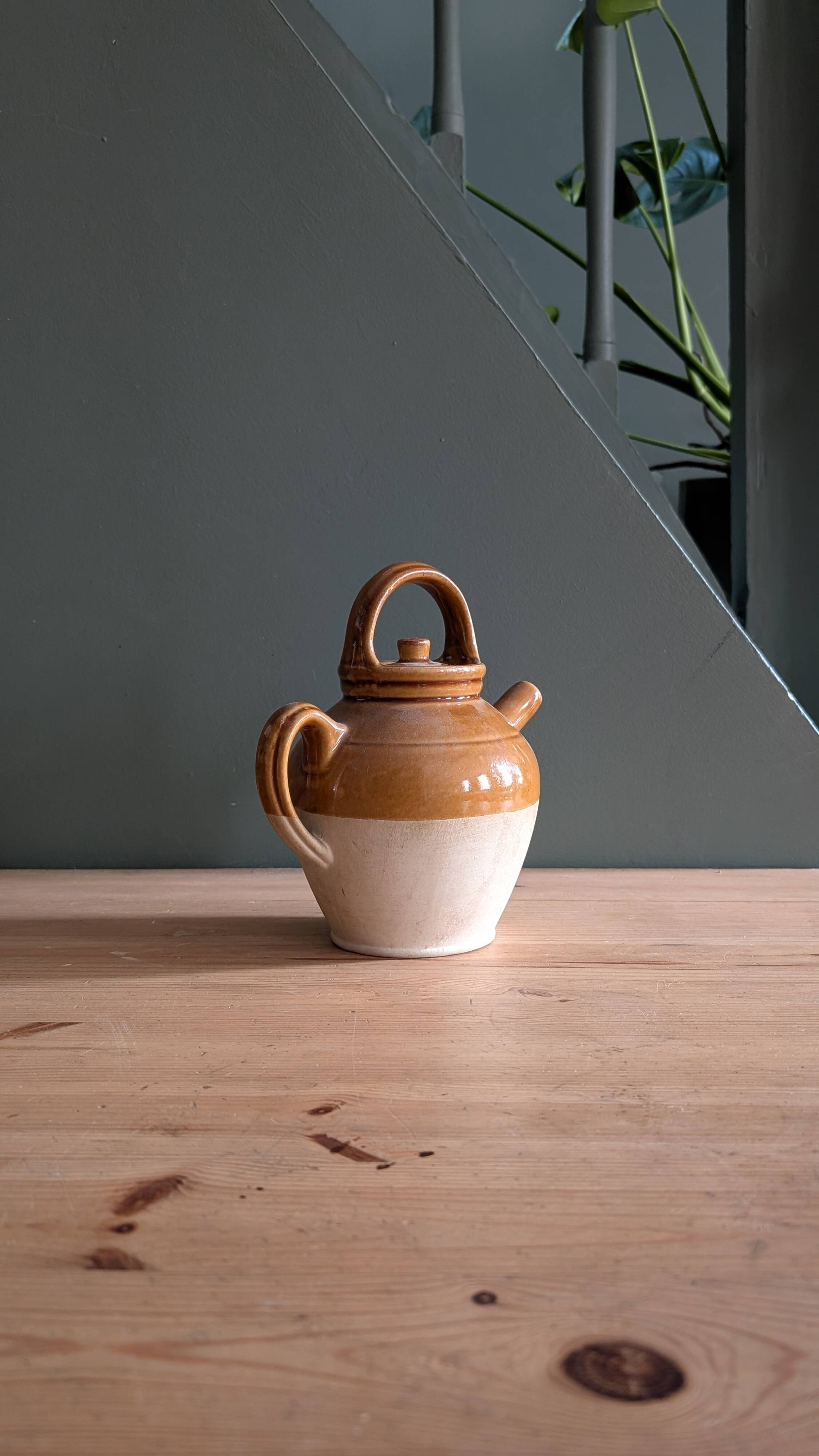 Glazed terracotta jug