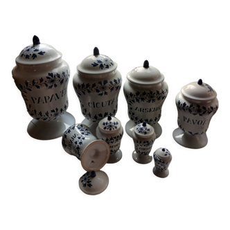 Series of 8 apothecary jars "AK" signed